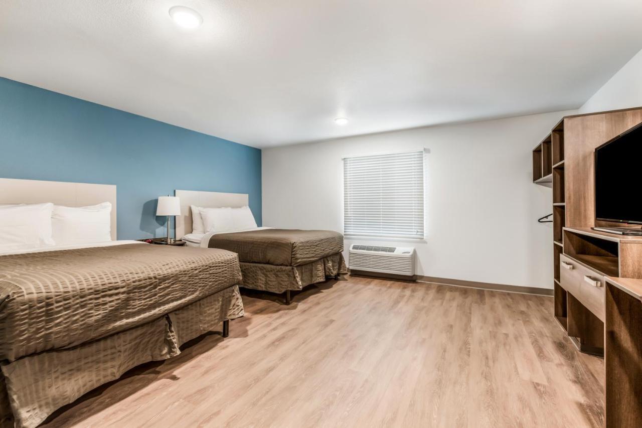 Woodspring Suites Charlotte - University Research Park Exteriör bild